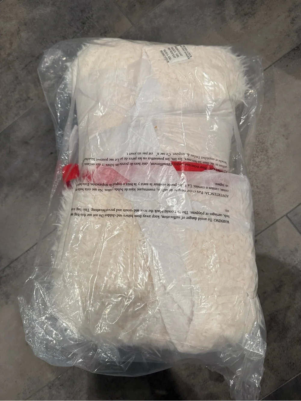 Express Ivory Faux Fur Throw with Red Ribbon Accent
